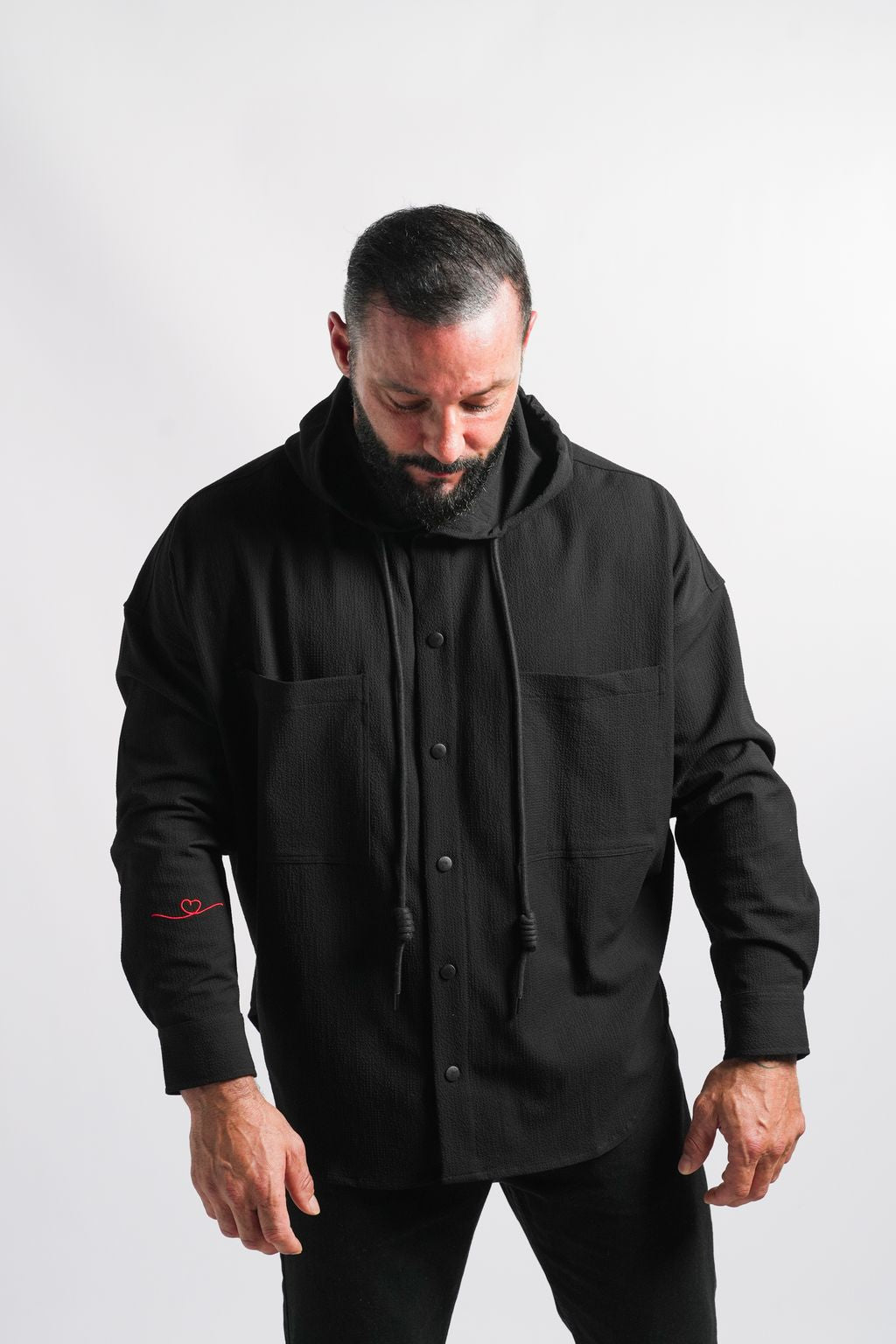 Veste Noire à Capuche Sculptée